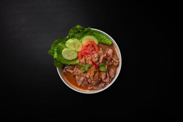 Stir Fried Lao Steak ຂົ້ວຊີ້ນ.